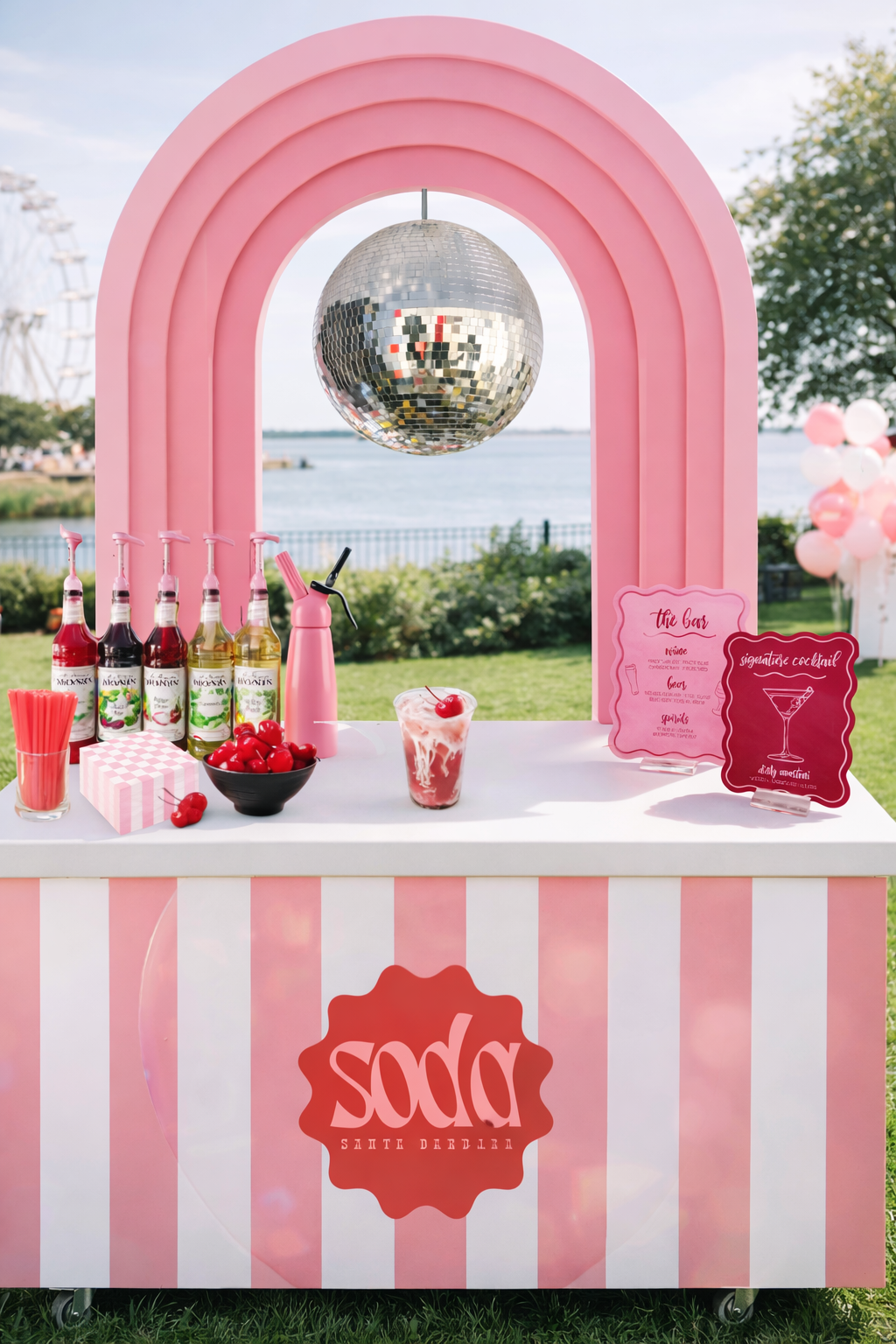 Funky retro pop-up dirty soda bar with disco balls and pink florals